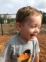 preschool_boy_laughing_on_playground_at_sunbrook_academy_at_woodstock_ga-338x450