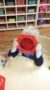 preschool_boy_looking_through_red_lense_sunbrook_academy_at_chapel_hill_douglasville_ga-248x450