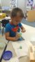 preschool_boy_making_green_playdough_winwood_childrens_center_gainesville_va-253x450