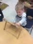 preschool_boy_playing_with_abacus_at_phoenix_childrens_academy_private_preschool_chandler_dobson-333x450