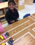 preschool_boy_playing_with_cars_at_next_generation_childrens_centers_hopkinton_ma-349x450