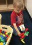 preschool_boy_playing_with_large_legos_cadence_academy_preschool_west_bridgewater_ma-326x450