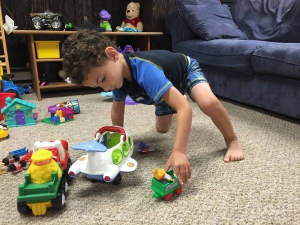 preschool_boy_playing_with_little_tykes_toy_prime_time_early_learning_centers_farmingdale_ny-600x450