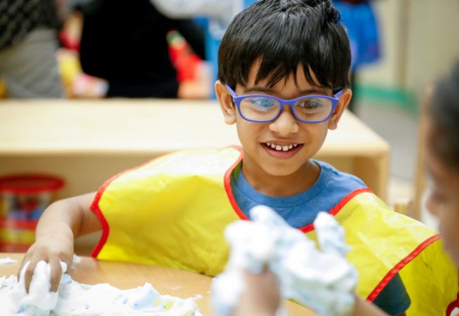 preschool_boy_playing_with_shaving_cream_winwood_childrens_center_brambleton_va-654x450