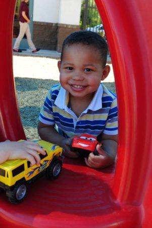 preschool_boy_playing_with_trucks_phoenix_childrens_academy_private_preschool_lindsay-301x450