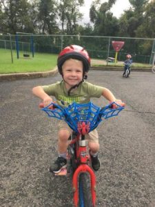 preschool_boy_riding_spiderman_bike_at_cadence_academy_meeting_pa-338x450