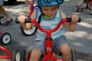 preschool_boy_riding_tricycle_at_bala_cynwyd_school_for_young_children_bala_cynwyd_pa-677x450