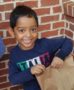 preschool_boy_smiling_outside_cadence_academy_preschool_mallard_charlotte_nc-372x450