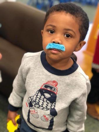 preschool_boy_wearing_blue_mustache_sunbrook_academy_at_barnes_mill_austell_ga-338x450