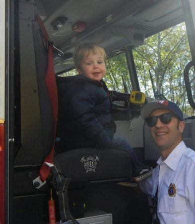 preschool_boy_with_fireman_creative_kids_childcare_centers_kent-393x450