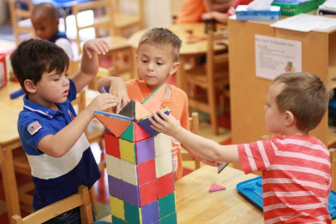 preschool_boys_building_a_tower_carolina_kids_child_development_center_fort_mill_sc-675x450