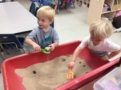 preschool_boys_digging_through_sand_cadence_academy_preschool_johnston_ia-603x450