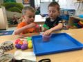 preschool_boys_filling_eggs_cadence_academy_preschool_tualatin_or-600x450