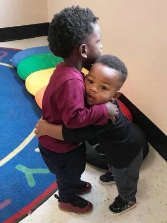 preschool_boys_hugging_at_cadence_academy_preschool_mount_pleasant_sc-337x450