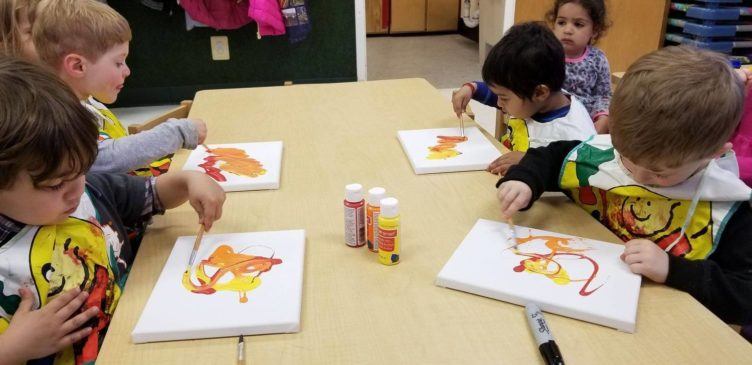 preschool_boys_painting_on_canvas_winwood_childrens_center_reston_va-752x365