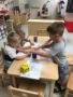 preschool_boys_playing_roll_and_color_cadence_academy_preschool_tualatin_or-338x450