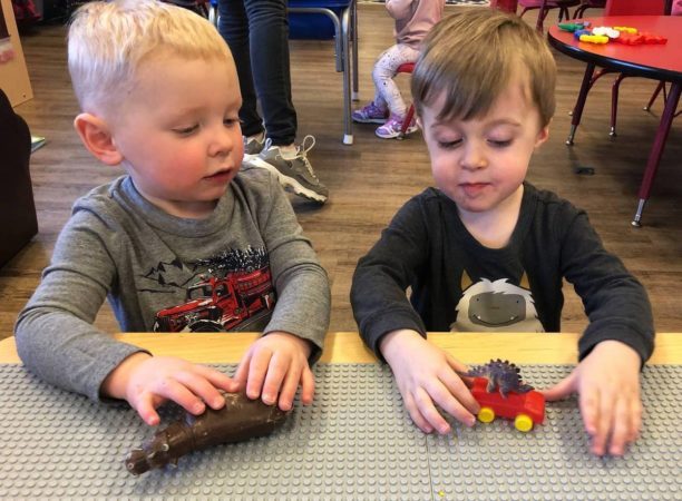preschool_boys_playing_with_cars_and_dinosaurs_at_cadence_academy_preschool_broomfield_co-612x450