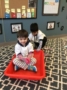 preschool_boys_playing_with_sled_inside_jonis_child_care_preschool_farmington_ct-336x450