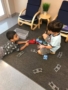 preschool_boys_playing_with_train_set_jonis_child_care_and_preschool_hartford_ct-338x450