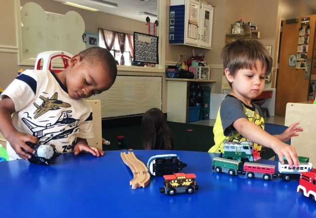 preschool_boys_playing_with_trucks_at_cadence_academy_preschool_charleston_sc-651x450