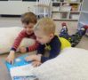 preschool_boys_reading_dr_suess_cadence_academy_preschool_clive_ia-497x450