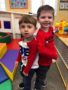 preschool_boys_standing_back_to_back_cadence_academy_preschool_smithfield_ri-338x450