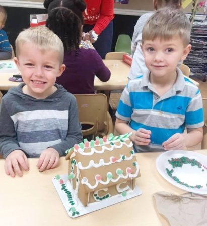 preschool_boys_with_gingerbread_house_mirror_lake_academy_villa_rica_ga-411x450