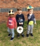preschool_boys_with_plate_hats_cadence_academy_preschool_greensboro_nc-390x450