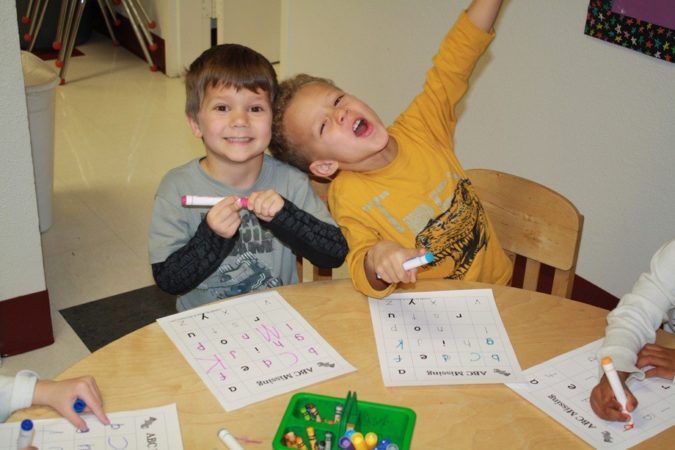 preschool_boys_writing_activity_cadence_academy_preschool_the_colony_tx-675x450