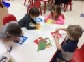 preschool_children_coloring_dinosaurs_creative_expressions_learning_center_imperial_mo-613x450