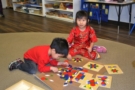 preschool_children_doing_tangram_activity_childrens_garden_montessori_richland_wa-675x450