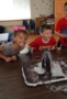 preschool_children_enjoying_volcano_science_activity_miss_muffets_learning_center_klamath_falls_or-307x450