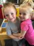 preschool_children_hugging_and_smiling_pusch_ridge_preschool__kindergarten-338x450