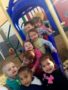 preschool_children_on_slide_phoenix_childrens_academy_private_preschool_surprise_az-338x450