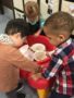 preschool_children_playing_at_activity_table_jonis_child_care_and_preschool_hartford_ct-338x450