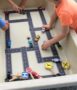 preschool_children_playing_cars_at_bala_cynwyd_school_for_young_children_bala_cynwyd_pa-386x450