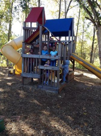 preschool_children_playing_on_playground_structure_cadence_academy_preschool_tacoma_wa-336x450