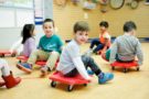 preschool_children_playing_on_rollers_winwood_childrens_center_brambleton_va-675x450