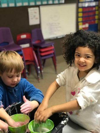 preschool_children_playing_with_colored_slime_cadence_academy_preschool_brentwood_portland_or-338x450