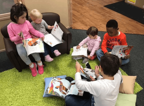 preschool_children_reading_books_at_cadence_academy_preschool_norwood_ma-612x450