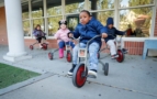 preschool_children_tricycles_cadence_academy_burr_ridge_il-713x450