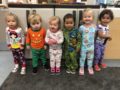 Children posing for a photo indoors