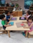 preschool_colored_square_activity_smaller_scholars_montessori_academy_grisby_tx-338x450