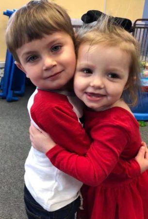 preschool_friends_hugging_cadence_academy_preschool_smithfield_ri-305x450