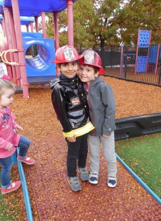 preschool_friends_on_playground_at_cadence_academy_preschool_prairie_city_folsom_ca-328x450