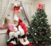 preschool_girl_and_santa_laughing_cadence_academy_preschool_greensboro_nc-502x450