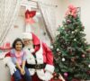 preschool_girl_and_santa_smiling_cadence_academy_preschool_greensboro_nc-500x450