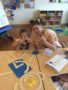 preschool_girl_and_teacher_doing_letter_activity_cadence_academy_preschool_austin_cedar_park_tx-338x450