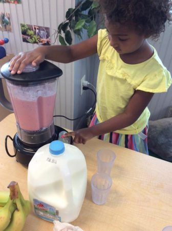 preschool_girl_blending_up_smoothie_winwood_childrens_center_ashburn_va-336x450