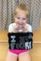 preschool_girl_celebrating_4th_birthday_adventures_in_learning_aurora_il-307x450